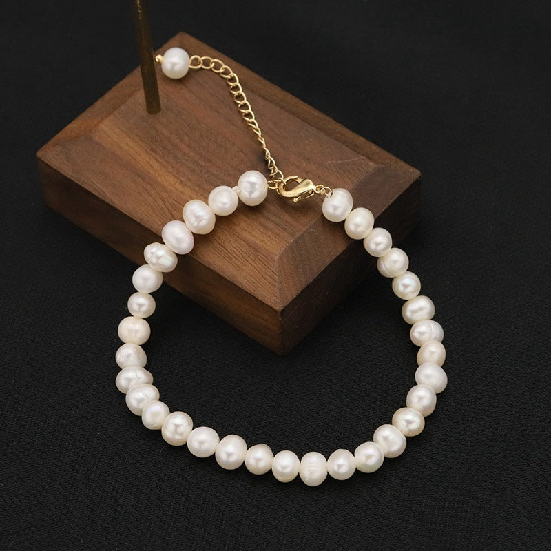 Liria Pearl – Pulsera de perlas naturales con mariposa y colgante | Tono dorado | Serenyah