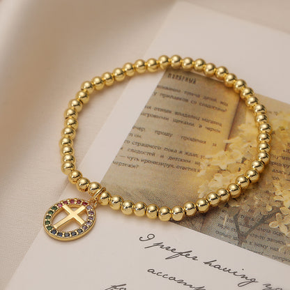 Santo Spirito – Gold Religious Bracelet with Cross & Virgin Mary Pendant | Zirconia | Serenyah