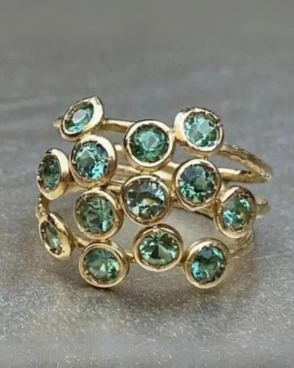 Anillo Auralie – Anillo multicapa chapado en oro con cristales verde aguamarina | Joyería de Glamour