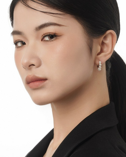Perla Halo Pearl Huggie Earrings in 925 Sterling Silver | Serenyah