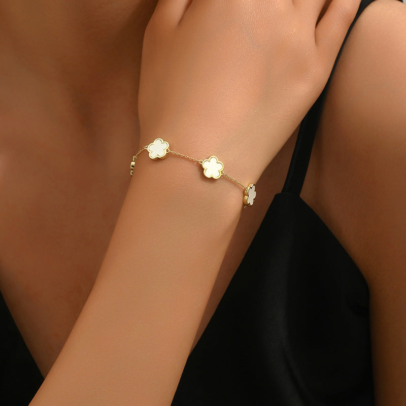 Eterna Fiore – Pulsera geométrica dorada de flor para mujer | 5 colores | Serenyah